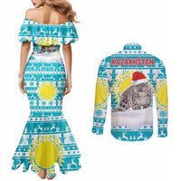 Kazakhstan Christmas Couples Matching Mermaid Dress and Long Sleeve Button Shirt with Snow Leopard in Santa Hat Blue and Yellow Reindeer Snowflake - Wonder Print Shop