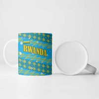 Rwanda Christmas Ceramic Mug with Blue-Yellow Pattern, Festive Geometric Motifs, and Bold Typography - Wonder Print Shop