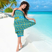Rwanda Christmas Sarong with Blue-Yellow Pattern, Festive Geometric Motifs, and Bold Typography - Wonder Print Shop