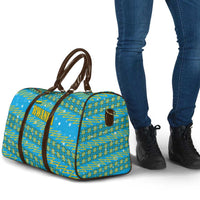 Rwanda Christmas Travel Bag with Blue-Yellow Pattern, Festive Geometric Motifs, and Bold Typography - Wonder Print Shop
