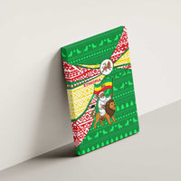 Ethiopia Christmas Canvas Wall Art with Santa Riding Lion Ethiopian Flag Colors and Tribal Pattern Design - Wonder Print Shop