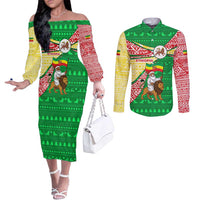 Ethiopia Christmas Couples Matching Off The Shoulder Long Sleeve Dress and Long Sleeve Button Shirt with Santa Riding Lion Ethiopian Flag Colors and Tribal Pattern Design - Wonder Print Shop