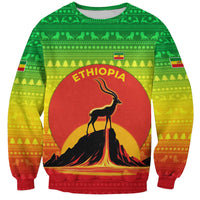 Ethiopia Christmas Sweatshirt with Mountain Gazelle Sunset Ethiopian Flag Colors and Tribal Pattern Design - Wonder Print Shop