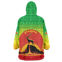 Ethiopia Christmas Wearable Blanket Hoodie with Mountain Gazelle Sunset Ethiopian Flag Colors and Tribal Pattern Design - Wonder Print Shop