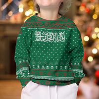 Saudi Arabia Christmas Kid Ugly Christmas Sweater with Green Pattern, Traditional Script Motif, and Camel Caravan Silhouette - Wonder Print Shop