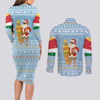 Seychelles Christmas Couples Matching Long Sleeve Bodycon Dress and Long Sleeve Button Shirt with Ocean Blue Pattern, Marlin Fish Artwork, and Surfing Santa Motif - Wonder Print Shop