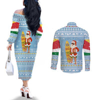 Seychelles Christmas Couples Matching Off The Shoulder Long Sleeve Dress and Long Sleeve Button Shirt with Ocean Blue Pattern, Marlin Fish Artwork, and Surfing Santa Motif - Wonder Print Shop