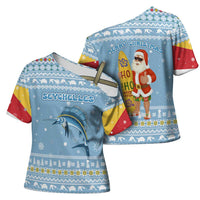 Seychelles Christmas Cross Shoulder Shirt with Ocean Blue Pattern, Marlin Fish Artwork, and Surfing Santa Motif - Wonder Print Shop