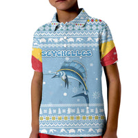 Seychelles Christmas Kid Polo Shirt with Ocean Blue Pattern, Marlin Fish Artwork, and Surfing Santa Motif - Wonder Print Shop