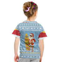 Seychelles Christmas Kid T Shirt with Ocean Blue Pattern, Marlin Fish Artwork, and Surfing Santa Motif - Wonder Print Shop