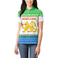 Sierra Leone Christmas Women Polo Shirt with Festive Green Pattern, Golden Lion Emblem, and Santa Sleigh Motif - Wonder Print Shop