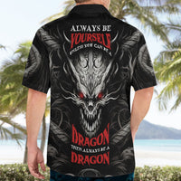 Black Hawaiian shirt back with demon skull artwork, red eyes, and dragon lettering