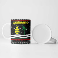 Suriname Christmas Ceramic Mug with Black Festive Pattern, Golden Ship, Palm Tree, and Coat of Arms Motif - Wonder Print Shop