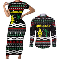 Suriname Christmas Couples Matching Short Sleeve Bodycon Dress and Long Sleeve Button Shirt with Black Festive Pattern, Golden Ship, Palm Tree, and Coat of Arms Motif - Wonder Print Shop