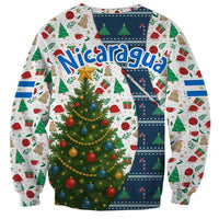 Nicaragua Christmas Sweatshirt with Santa Cooking Gallina Rellena Tree Flag and Festive Icons Design - Wonder Print Shop