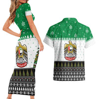 United Arab Emirates Christmas Couples Matching Short Sleeve Bodycon Dress and Hawaiian Shirt with Falcon Tree Design Snowflake Pattern and National Emblem - Wonder Print Shop