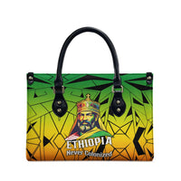 Menelik II Leather Bag with Crowned Portrait, Ethiopia Never Colonized Text and Pan-African Abstract - Wonder Print Shop