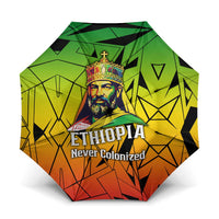Menelik II Umbrella with Crowned Portrait, Ethiopia Never Colonized Text and Pan-African Abstract - Wonder Print Shop