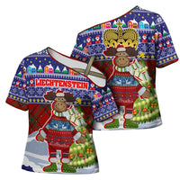 Liechtenstein Christmas Cross Shoulder Shirt with Reindeer Character Holiday Village and Plaid Sleeves - Wonder Print Shop