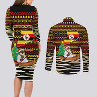 Uganda Christmas Couples Matching Long Sleeve Bodycon Dress and Long Sleeve Button Shirt with Santa in Canoe Christmas Tree Uganda Map Flag and Black Red Yellow Tribal Pattern Design - Wonder Print Shop