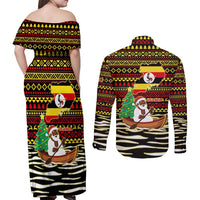 Uganda Christmas Couples Matching Off Shoulder Maxi Dress and Long Sleeve Button Shirt with Santa in Canoe Christmas Tree Uganda Map Flag and Black Red Yellow Tribal Pattern Design - Wonder Print Shop