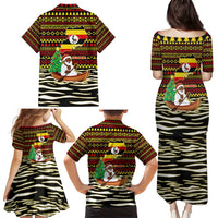 Uganda Christmas Family Matching Puletasi and Hawaiian Shirt with Santa in Canoe Christmas Tree Uganda Map Flag and Black Red Yellow Tribal Pattern Design - Wonder Print Shop