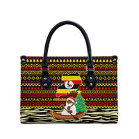Uganda Christmas Leather Bag with Santa in Canoe Christmas Tree Uganda Map Flag and Black Red Yellow Tribal Pattern Design - Wonder Print Shop