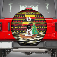 Uganda Christmas Spare Tire Cover with Santa in Canoe Christmas Tree Uganda Map Flag and Black Red Yellow Tribal Pattern Design - Wonder Print Shop