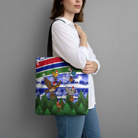 Gambia Christmas Tote Bag with Santa Birds Gift Boxes Forest Scene and Snowflake Pattern Design - Wonder Print Shop
