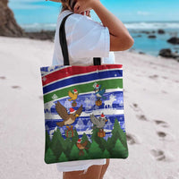 Gambia Christmas Tote Bag with Santa Birds Gift Boxes Forest Scene and Snowflake Pattern Design - Wonder Print Shop