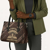Chinua Achebe Leather Bag with Tribal Symbol Design, The Storyteller Quote and Africa Wrote Back - Wonder Print Shop