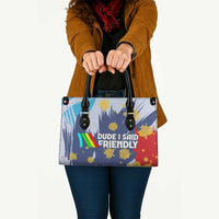 Dude I Said Friendly Graphic Leather Bag with Gold Paint Splatter and Retro Stripes