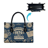 Legend 1976 Vintage Gears and Scrolls Design Leather Bag with Crown Motif in Classic Blue and Beige Retro