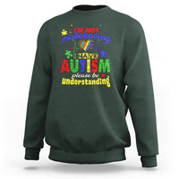 Dark forest green autism mom sweatshirt with colorful front text graphic, “I’m not misbehaving”