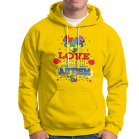 Daisy yellow autism-themed hoodie with colorful front graphic, drawstring hood, kangaroo pocket.