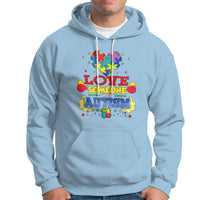 Light blue autism-themed hoodie with colorful front graphic, drawstring hood, kangaroo pocket.