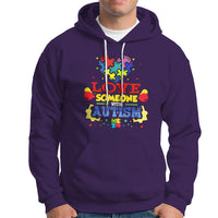 Purple autism-themed hoodie with colorful front graphic, drawstring hood, kangaroo pocket.