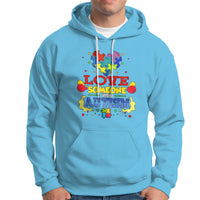 Sky blue autism-themed hoodie with colorful front graphic, drawstring hood, kangaroo pocket.