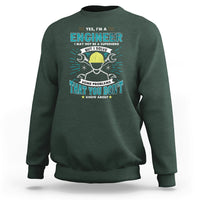 Dark forest green crewneck sweatshirt with engineer graphic and text on the chest