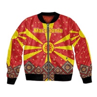 Macedonia Christmas Bomber Jacket with Yellow Sun, Santa, and Festive Tree Motif - Wonder Print Shop