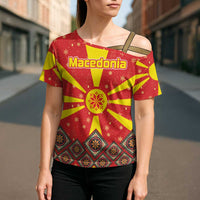 Macedonia Christmas Cross Shoulder Shirt with Yellow Sun, Santa, and Festive Tree Motif - Wonder Print Shop
