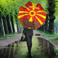 Macedonia Christmas Umbrella with Yellow Sun, Santa, and Festive Tree Motif - Wonder Print Shop