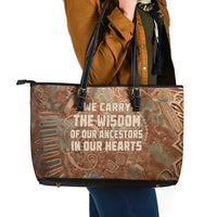 We Carry The Wisdom Leather Tote Bag African Ancient Symbols, Earthy Tones, and Ancestral Wisdom Quote - Wonder Print Shop