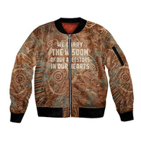 We Carry The Wisdom Sleeve Zip Bomber Jacket African Ancient Symbols, Earthy Tones, and Ancestral Wisdom Quote - Wonder Print Shop