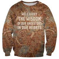 We Carry The Wisdom Sweatshirt African Ancient Symbols, Earthy Tones, and Ancestral Wisdom Quote - Wonder Print Shop