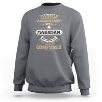 Charcoal gray crewneck sweatshirt with accountant-themed graphic and “MIGHT BE CONFUSED” text