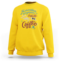 Fuelled by Coffee engineer graphic daisy yellow crewneck sweatshirt.