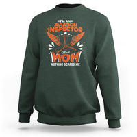 Dark forest green crewneck sweatshirt with “Aviation Inspector Mom” eagle graphic on front