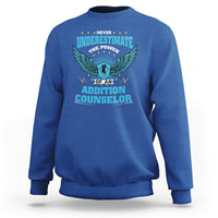 Royal blue crewneck sweatshirt with front eagle graphic and 'Addiction Counselor' text