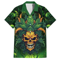 Green Hawaiian shirt with skull face and orange leaf design, button front